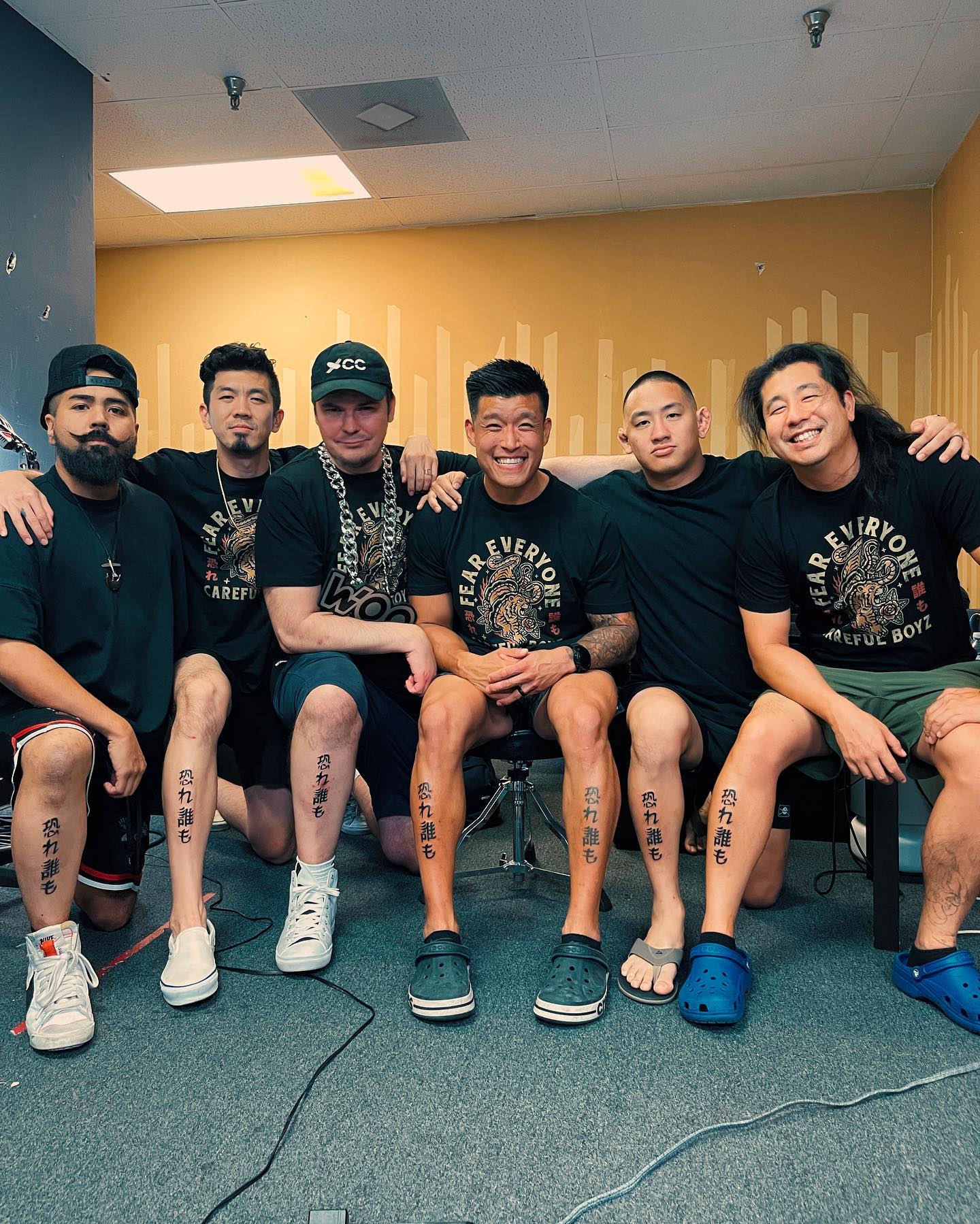 The Careful Boyz revealing their matching FEAR EVERYONE shin tattoos, September 2023